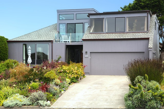195 Condor Ct Unit 1061, Bodega Bay, CA 94923 - view of front of property with roof with shingles, driveway, and a garage