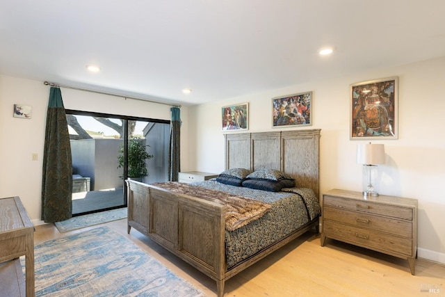 bedroom featuring access to outside, recessed lighting, light wood-style floors, and baseboards