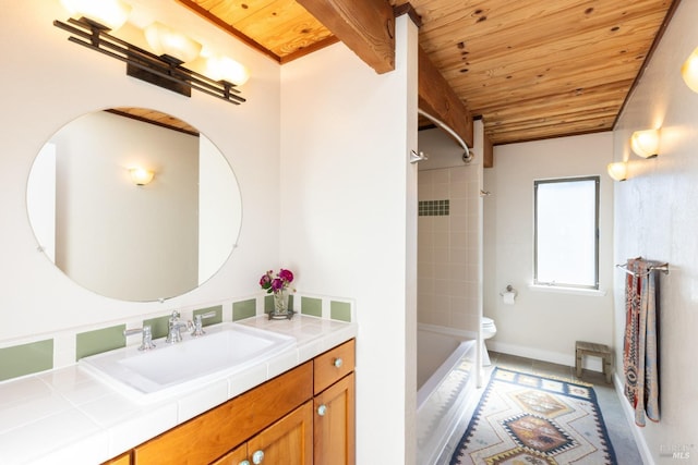 bathroom with beam ceiling, toilet, wood ceiling, bathtub / shower combination, and vanity