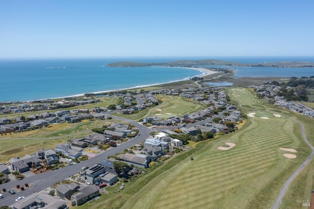 birds eye view of property featuring golf course view, a water view, and a residential view