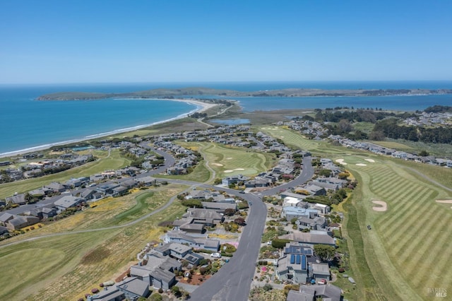 aerial view with a residential view, a water view, and view of golf course