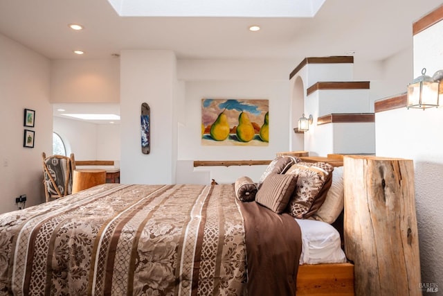 bedroom featuring recessed lighting