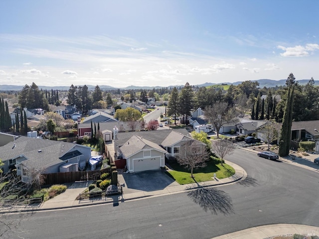 birds eye view of property featuring a residential view and a mountain view