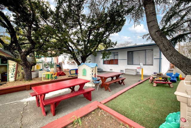 exterior space featuring an outbuilding and outdoor dining space