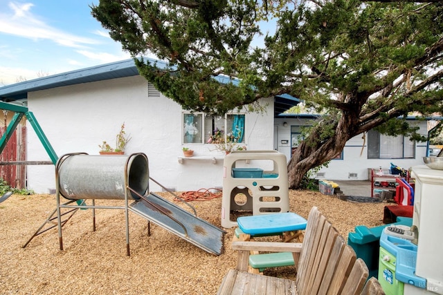 exterior space with stucco siding