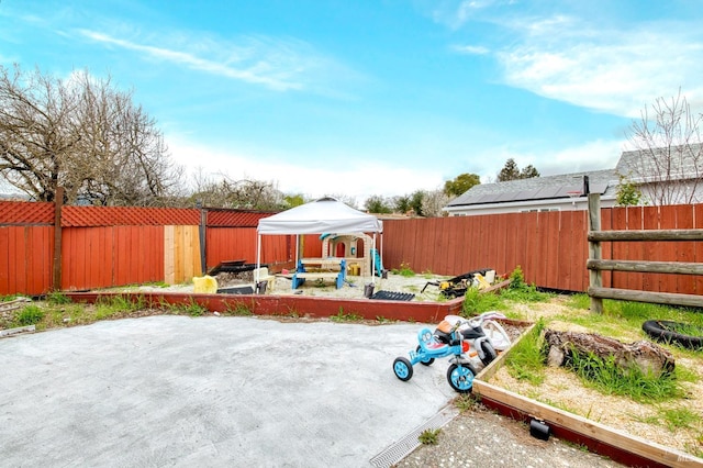 view of yard with a patio area and a fenced backyard