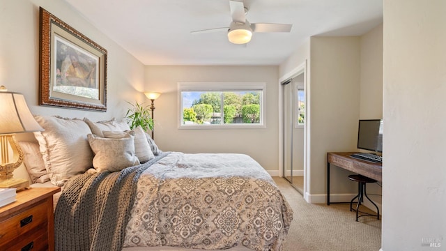 bedroom with baseboards, ceiling fan, and light colored carpet