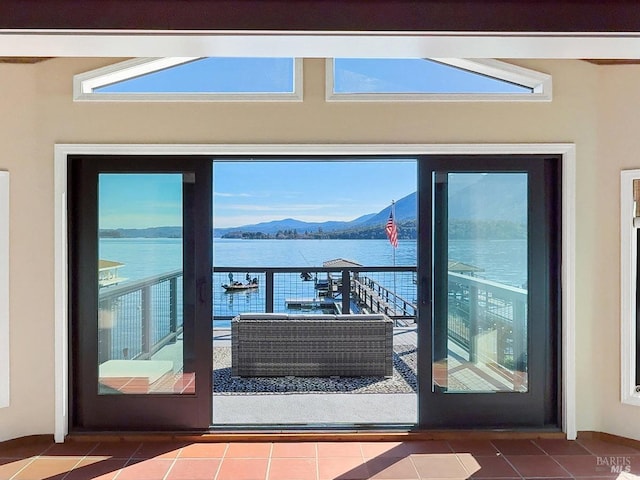 balcony with a water and mountain view