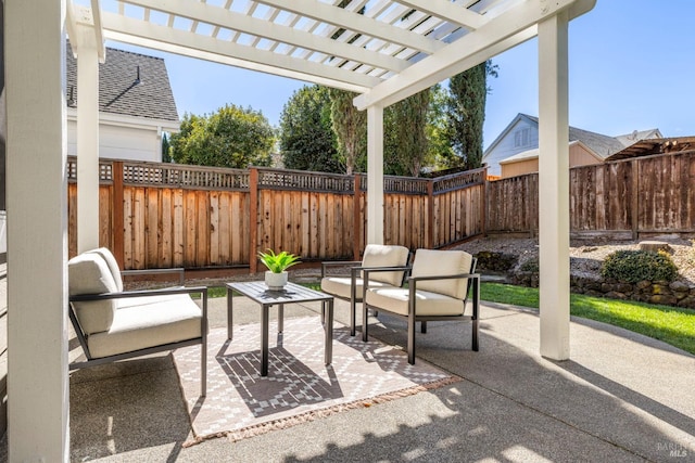 view of patio featuring an outdoor hangout area, a fenced backyard, and a pergola