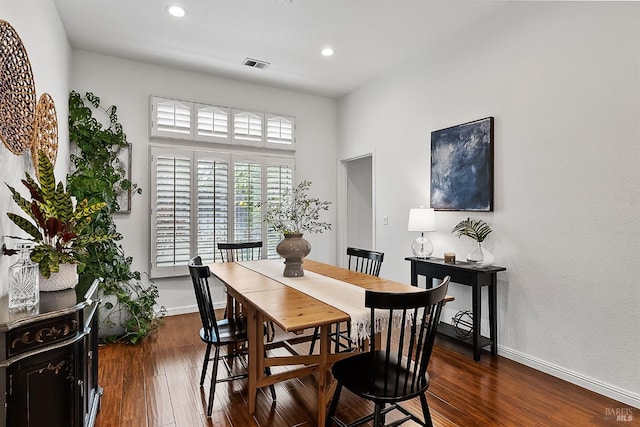 dining room featuring recessed lighting, visible vents, and dark wood finished floors
