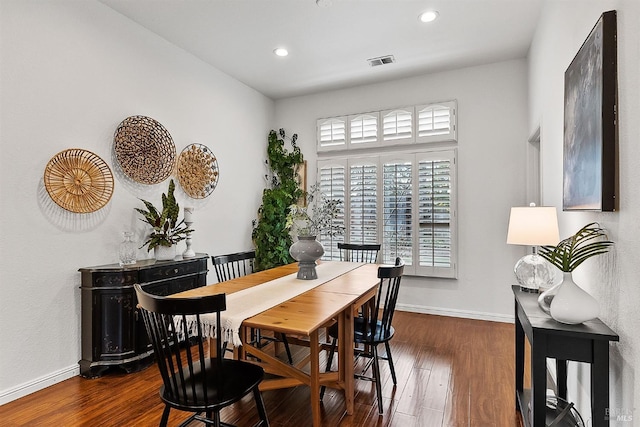 dining area featuring recessed lighting, dark wood-type flooring, visible vents, and baseboards