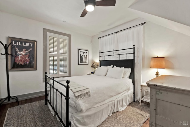 bedroom with a ceiling fan and wood finished floors