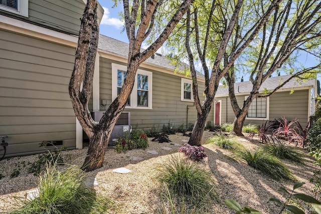 exterior space featuring central AC unit