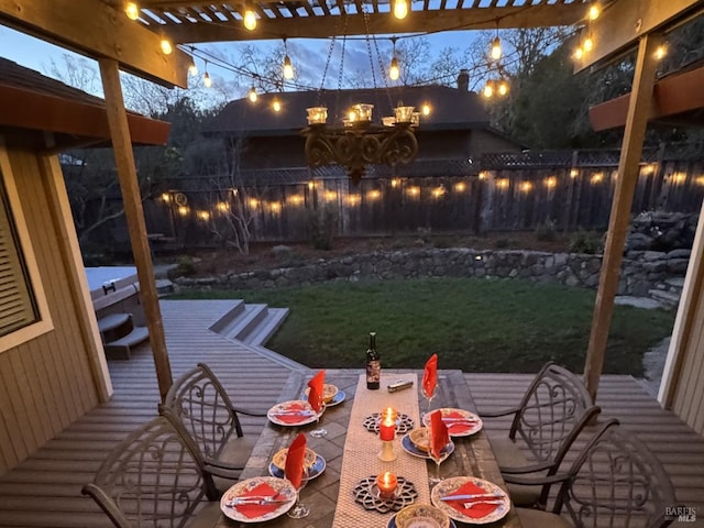 view of yard with a fenced backyard and outdoor dining space