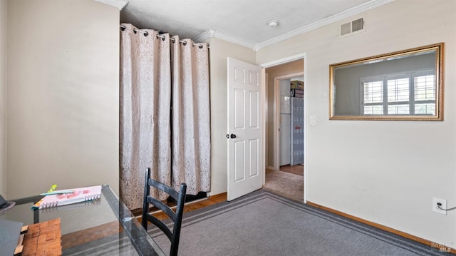 bedroom featuring baseboards, visible vents, and crown molding