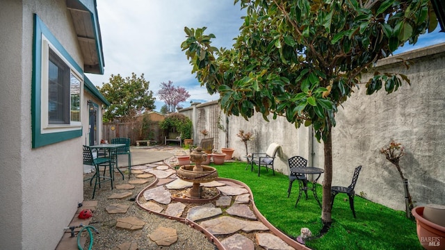 view of patio with a fenced backyard