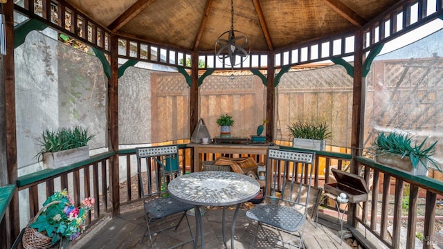 wooden terrace with a gazebo