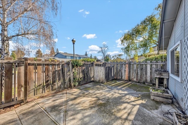 view of patio with a fenced backyard