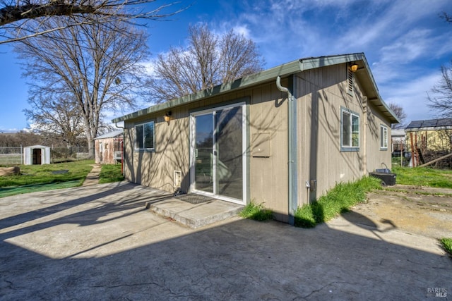 back of house featuring a patio