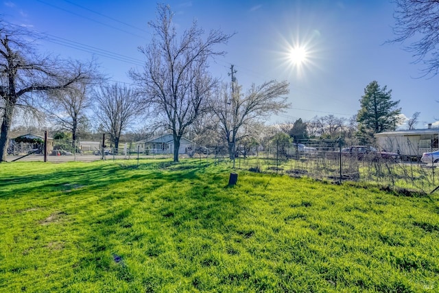 view of yard with fence