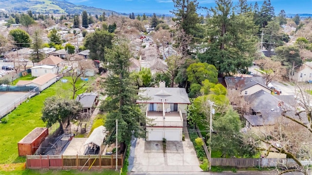 bird's eye view featuring a residential view and a mountain view