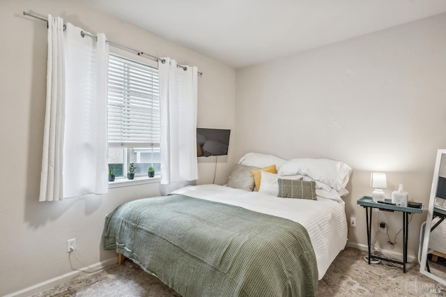 bedroom with baseboards