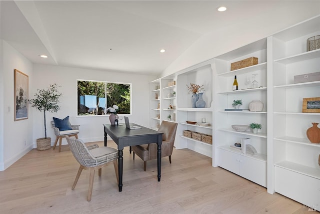 office space with lofted ceiling, light wood finished floors, baseboards, and recessed lighting