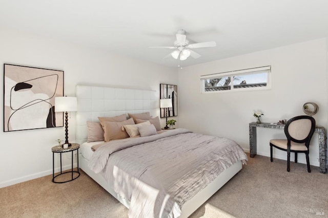 bedroom featuring carpet and baseboards