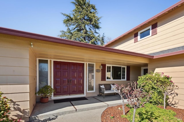 doorway to property featuring a porch