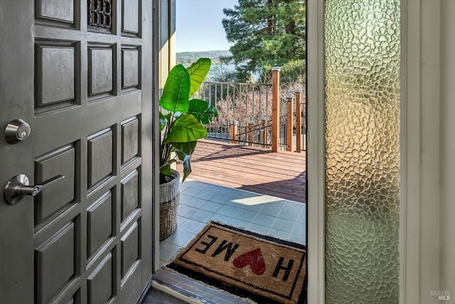 entryway featuring tile patterned flooring