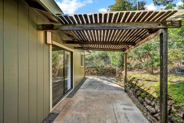 view of patio featuring a pergola