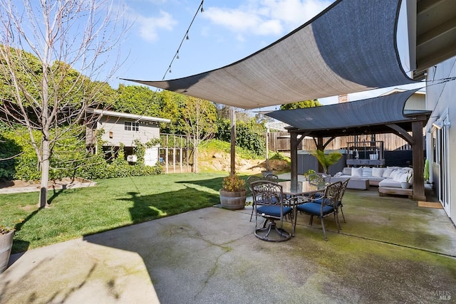 view of patio featuring outdoor dining space, outdoor lounge area, and fence