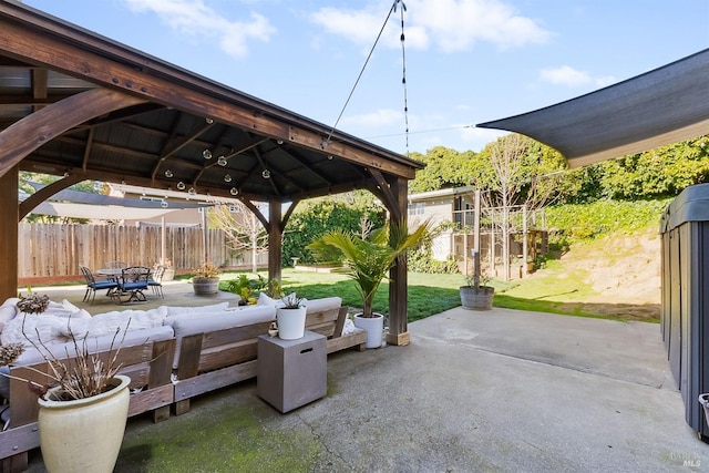 view of patio / terrace with a gazebo and fence