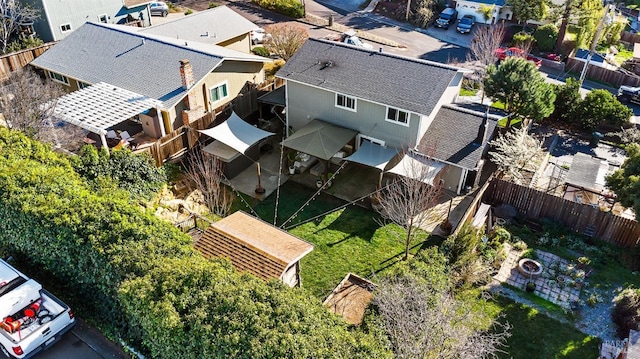 birds eye view of property with a residential view