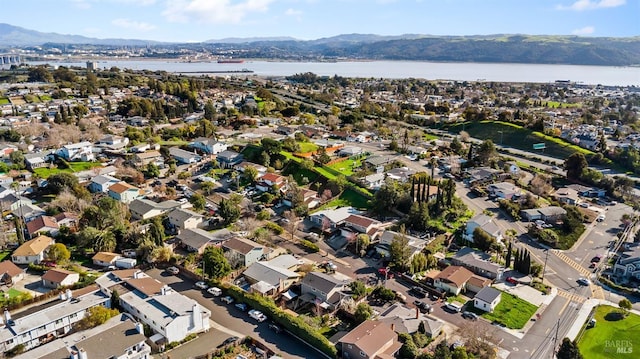 aerial view with a water and mountain view