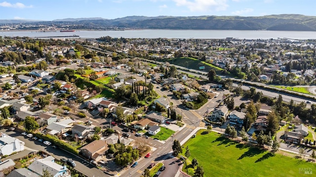 aerial view with a residential view and a water and mountain view