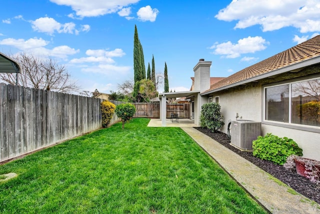 view of yard with a fenced backyard, cooling unit, and a patio