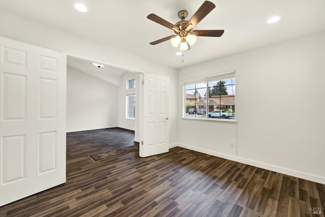 unfurnished room featuring dark wood finished floors, recessed lighting, and a healthy amount of sunlight