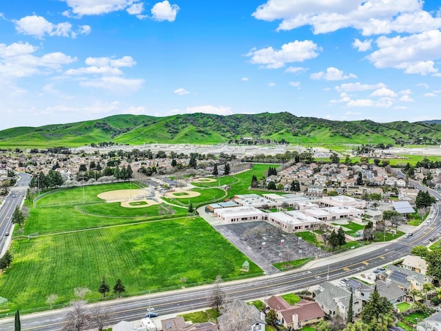 bird's eye view with a residential view and a mountain view