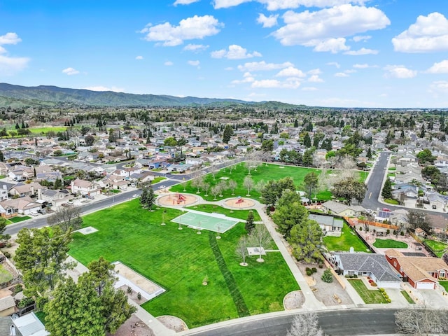 drone / aerial view featuring a mountain view and a residential view