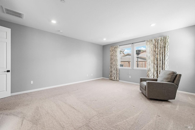 unfurnished room featuring visible vents, recessed lighting, baseboards, and carpet floors