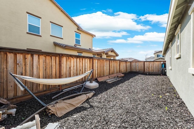 view of yard featuring a fenced backyard