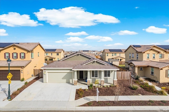 view of front of property with a residential view, a tile roof, and fence