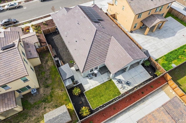 birds eye view of property with a residential view