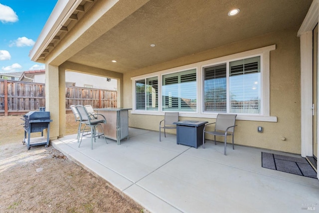 view of patio / terrace featuring fence and area for grilling