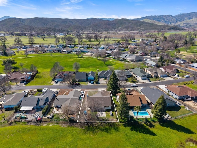 aerial view with a residential view and a mountain view