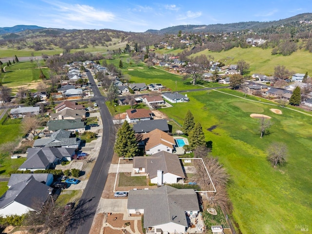 bird's eye view with a residential view and a mountain view