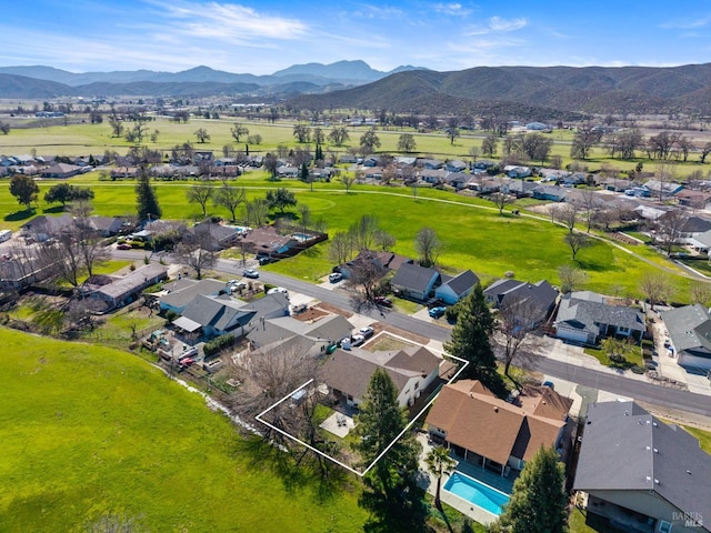 bird's eye view featuring a residential view and a mountain view