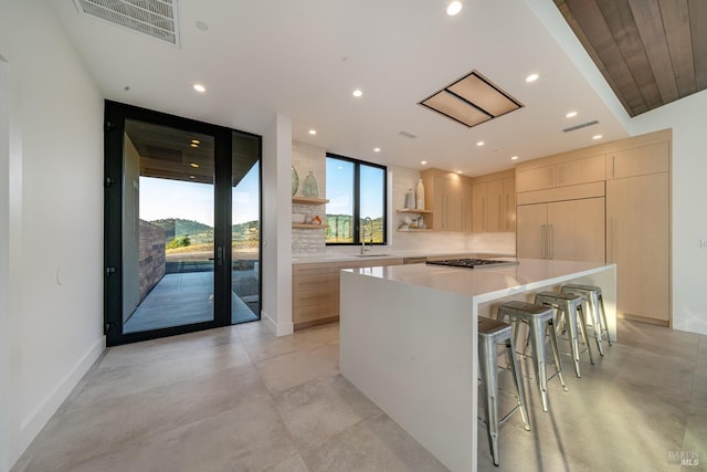 3400 Atlas Peak Rd, Napa, CA 94558 - kitchen featuring visible vents, light brown cabinetry, decorative backsplash, open shelves, and modern cabinets
