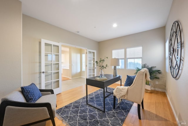 office area featuring recessed lighting, french doors, baseboards, and wood finished floors